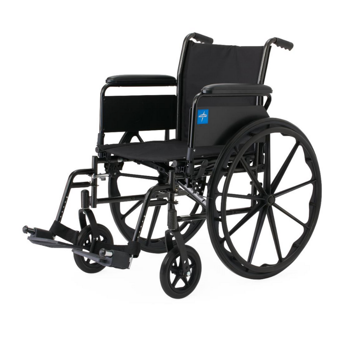 The Medline Lightweight K3 Wheelchair, shown angled against a white background, features a black nylon seat and backrest, large rear wheels, small front wheels, armrests, and footrests.